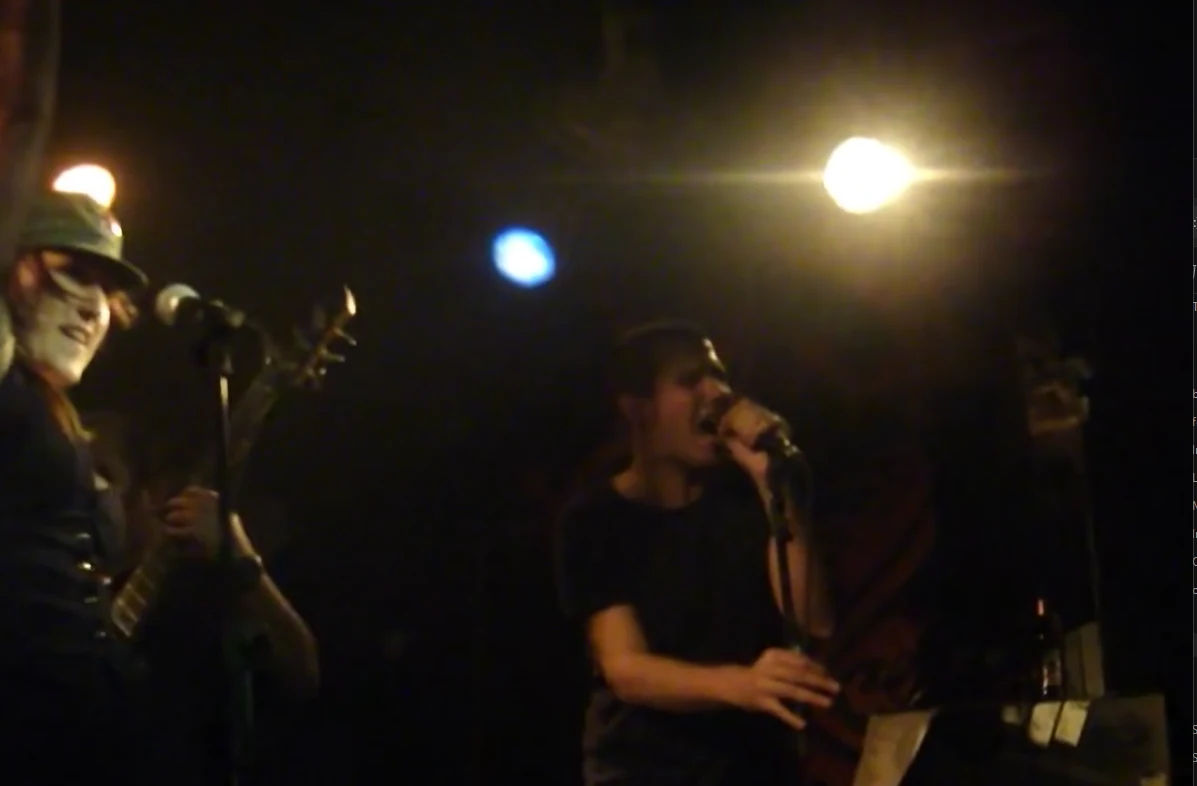 Emma singing live with Scary Magic