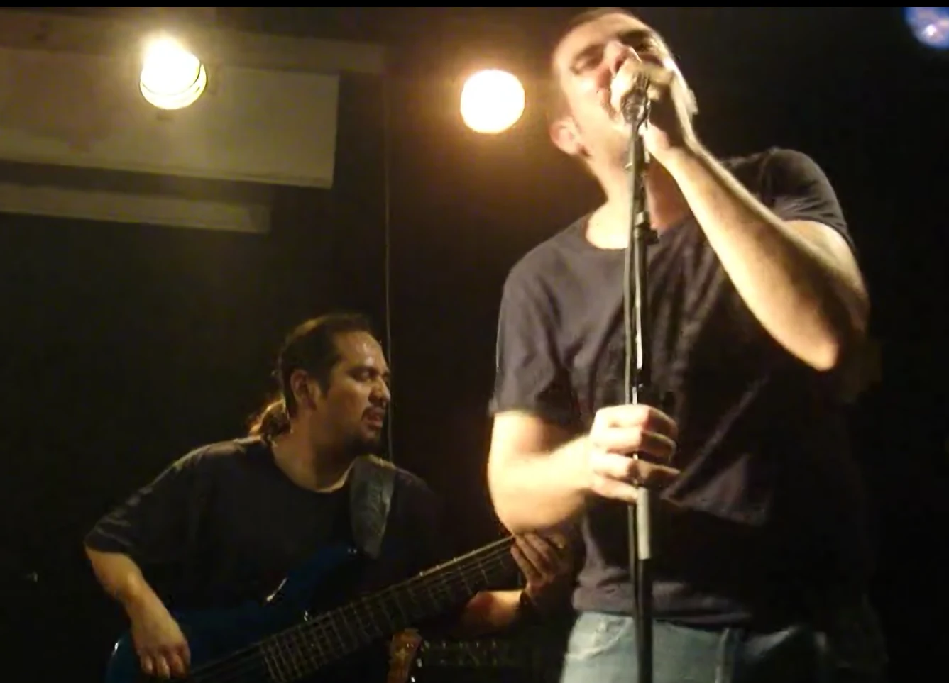 Scary Magic vocalist and bass player performing live